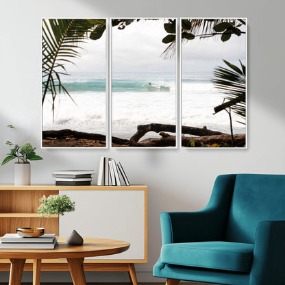 Tropical beach view with palm trees and surfer riding a wave, perfect for boho or coastal-inspired interior wall decor.