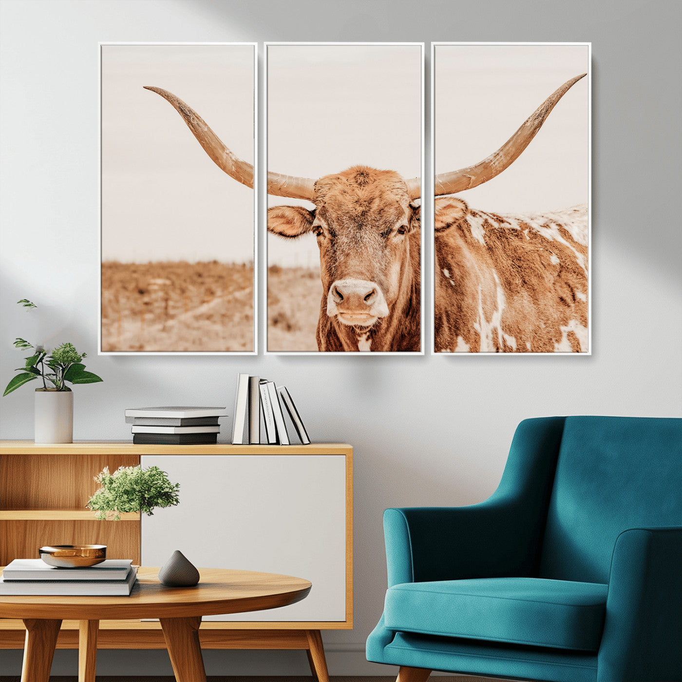 A longhorn bull standing proudly in a sunlit desert field with warm neutral tones, ideal for rustic western or farmhouse interiors.