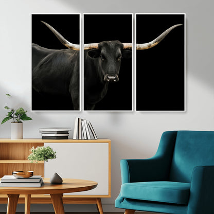 Close-up of a black Texas longhorn with large curved horns on black background, ideal for rustic farmhouse or modern western interiors.