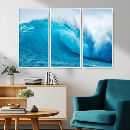 Vibrant canvas of a powerful curling ocean wave in tropical blue tones, perfect for coastal or surf-inspired decor settings.