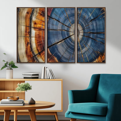A stunning close-up view of a tree trunk, showcasing the intricate growth rings in a vibrant mix of warm browns, cool blues, and hints of natural texture.