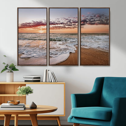 Canvas of a sunset over a foamy ocean shore with warm light and gentle waves, ideal for coastal or beach-themed home decor.
