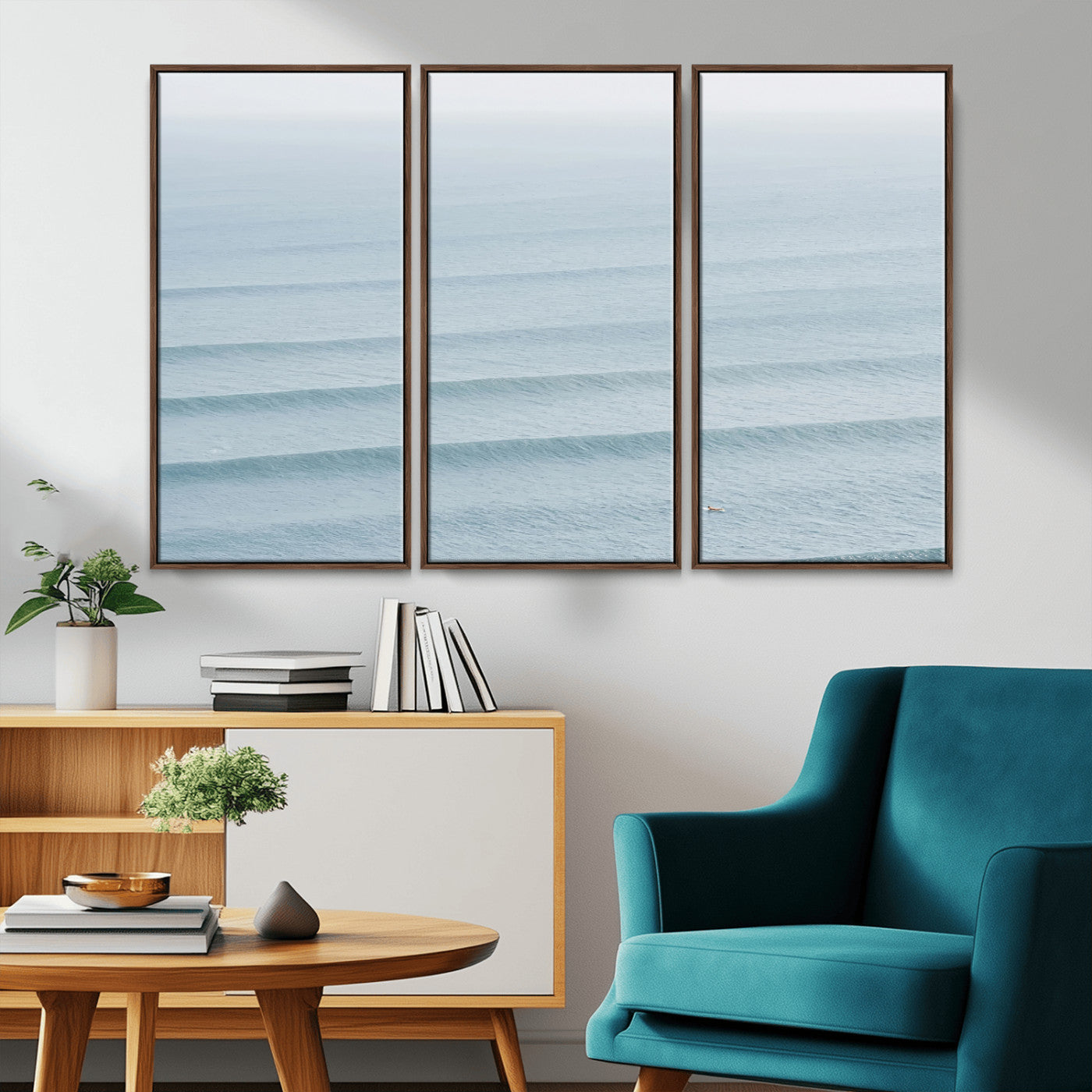 Framed canvas of repeating ocean waves with a distant solo surfer, ideal for minimalist ocean or calm coastal wall decor.