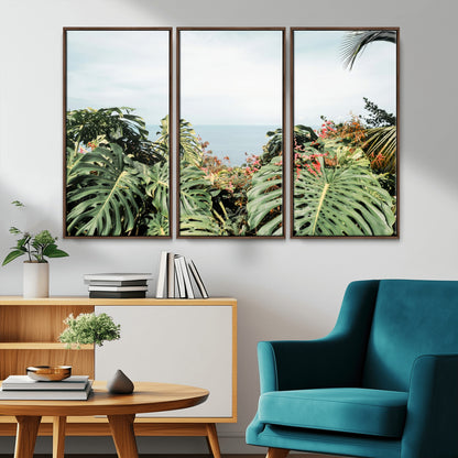 Monstera leaves and tropical flowers framing a calm ocean view, ideal for tropical coastal or exotic jungle-style interior wall decor.