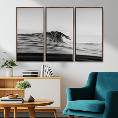 Striking black and white photo of a curling wave, ideal for modern coastal or minimalist wall decor settings.