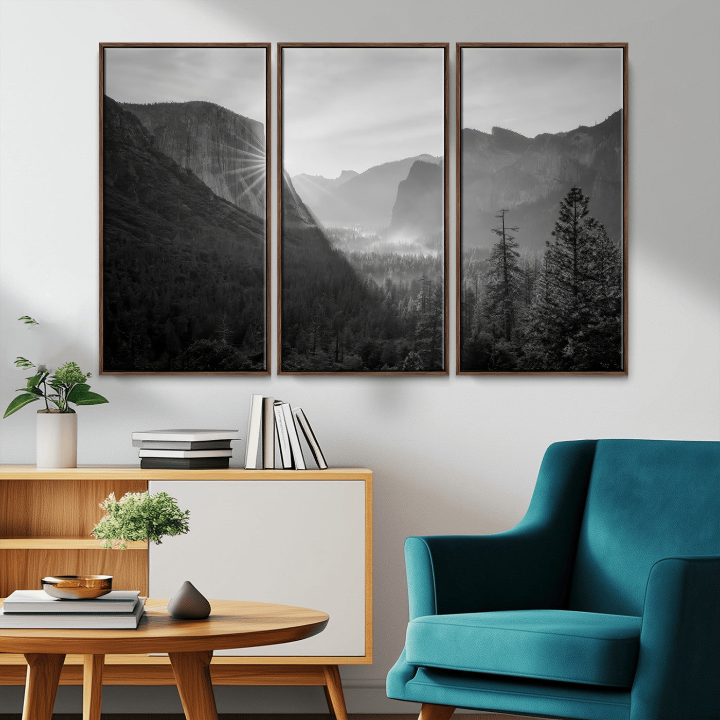Black and white landscape of Yosemite with sun rays peeking over El Capitan, ideal for moody nature or modern rustic decor.