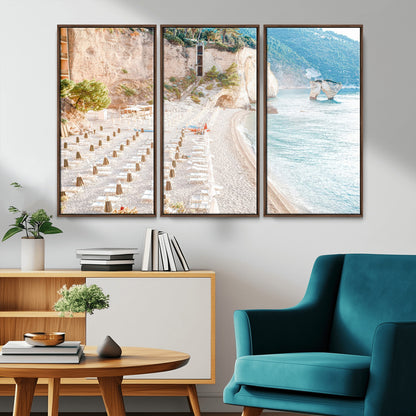 Wall art of a calm Mediterranean beach with rows of sun loungers and umbrellas in soft pastel tones, perfect for light coastal or vacation-themed decor.