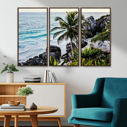 Framed canvas of a vibrant tropical coastline with palm trees, rocky cliffs, and turquoise waters, ideal for tropical coastal home decor.