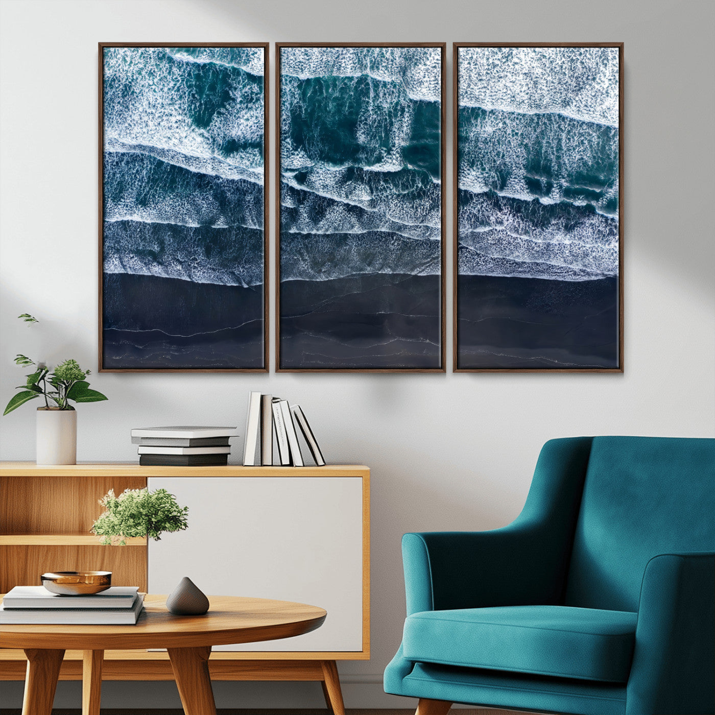 Canvas of aerial ocean waves crashing onto a black sand beach in moody tones, ideal for modern coastal or minimalist home decor.