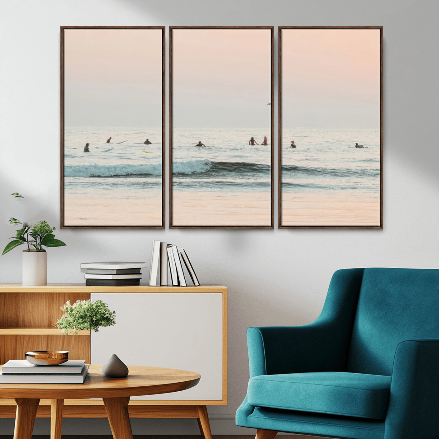 Dreamy photo of surfers waiting on soft pastel waves under a pink sunset sky, ideal for soft coastal minimalist or serene ocean-themed home decor.