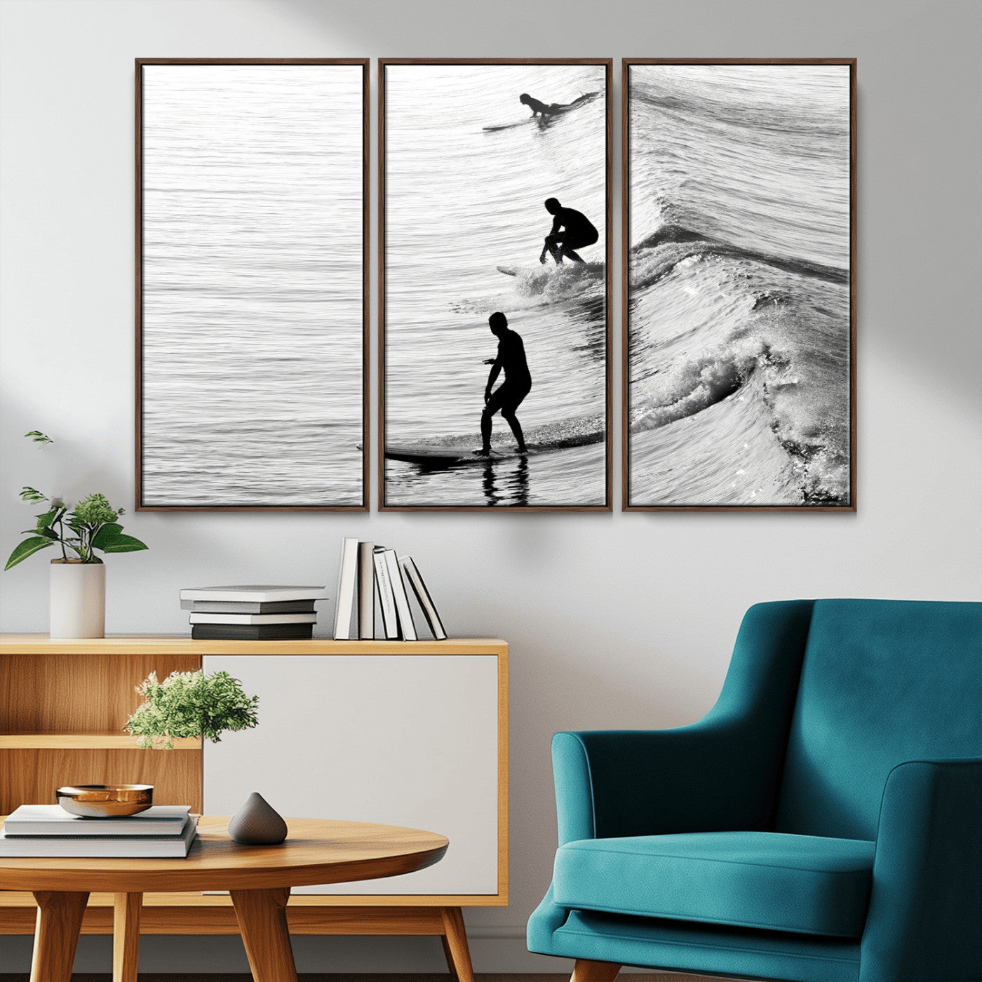 Black and white photo of surfers riding waves in a moody, high-contrast scene, ideal for modern coastal or surf-inspired home decor.