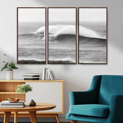 A dramatic black and white ocean wave crashing with immense force, capturing the raw power and movement of the sea in a bold seascape.