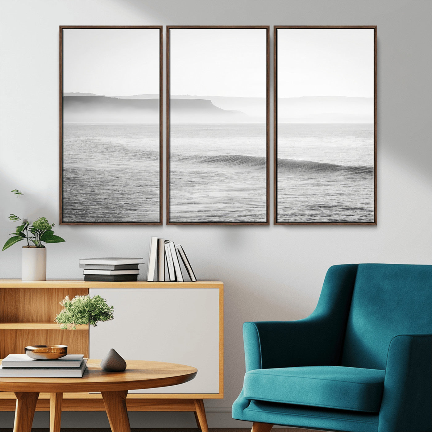 A black and white minimalist seascape featuring soft rolling waves and misty distant cliffs, creating a serene and timeless coastal atmosphere.