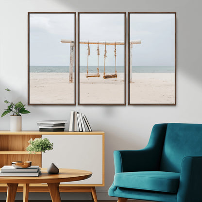 A rustic wooden beach swing stands on a serene sandy shore with an ocean horizon in the background, creating a tranquil and dreamy coastal escape.
