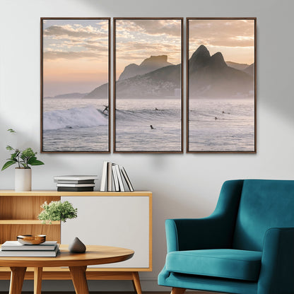 A surfer rides a golden hour wave near misty coastal mountains, surrounded by fellow surfers, capturing the spirit of a coastal adventure.