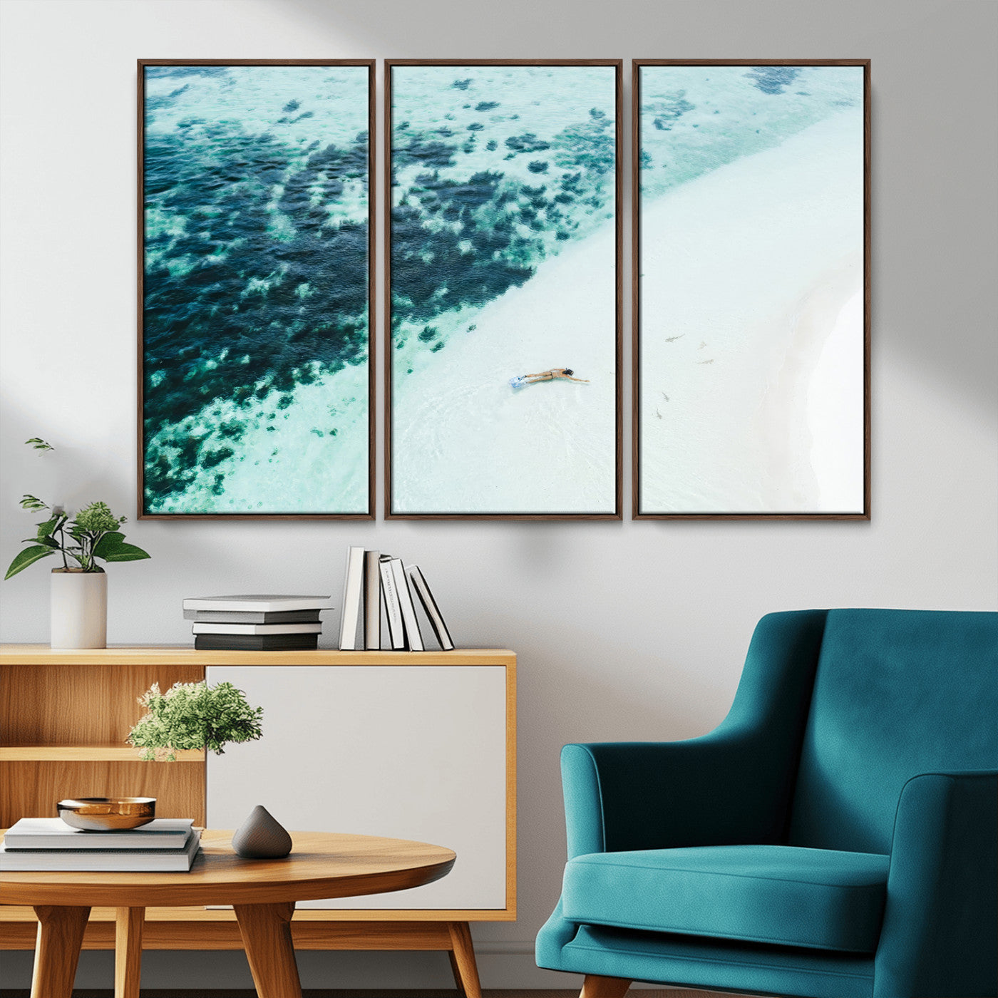Canvas featuring an aerial view of a swimmer in shallow turquoise waters with coral patterns, ideal for tropical coastal home decor.