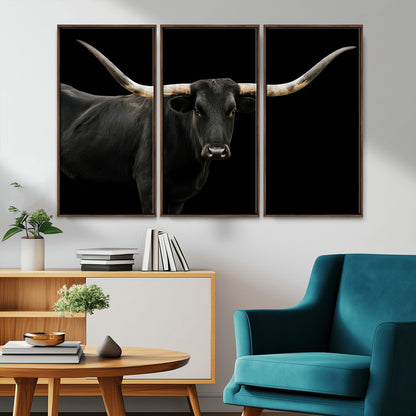 Close-up of a black Texas longhorn with large curved horns on black background, ideal for rustic farmhouse or modern western interiors.