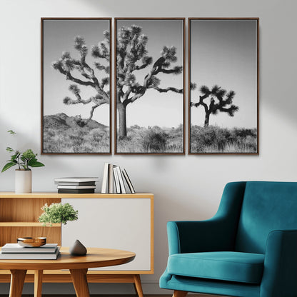 Black and white Joshua trees in a rugged desert landscape, creating a calm and minimalist feel for natural or rustic-themed interiors.