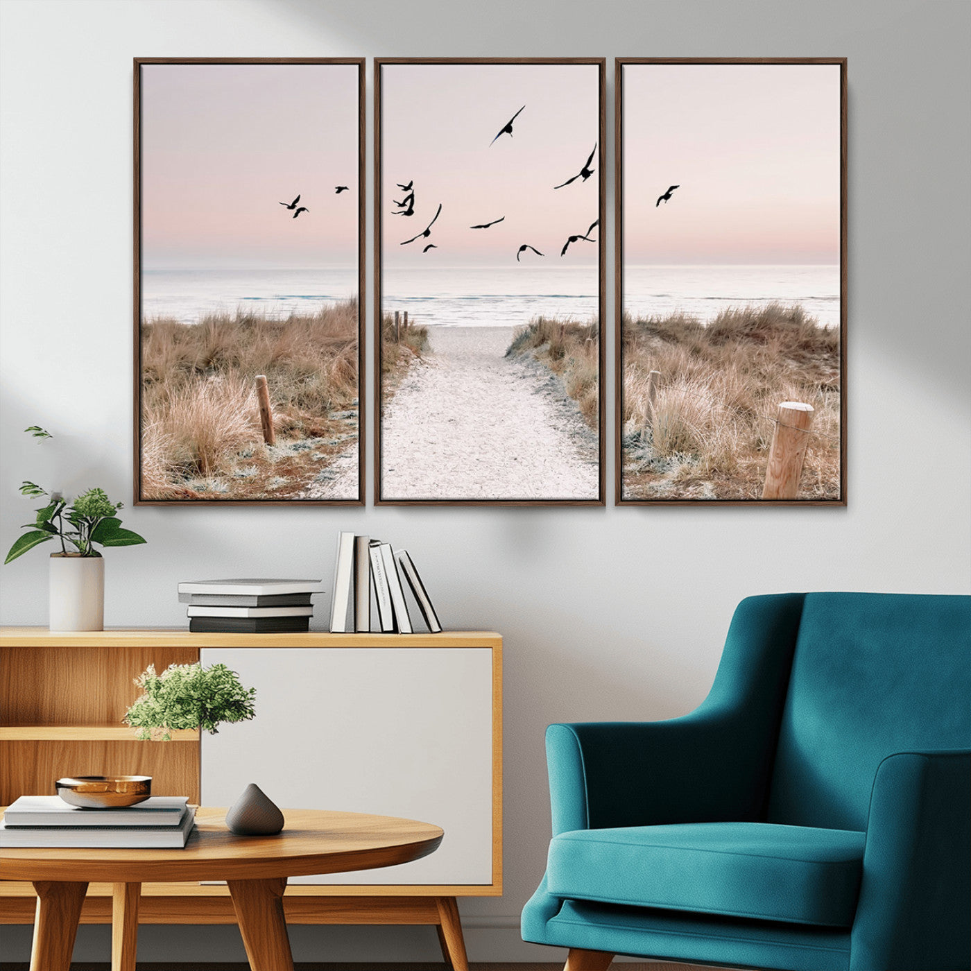 A peaceful coastal pathway leading to the ocean, with birds flying across a soft pastel sky, creating a calm and scenic beach atmosphere.