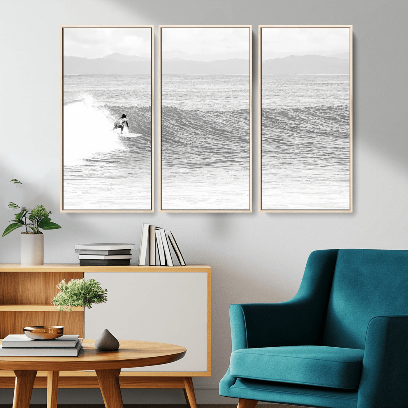 Monochrome photo of a surfer riding a wave with distant mountains, ideal for coastal motion or black and white surf-themed wall decor.