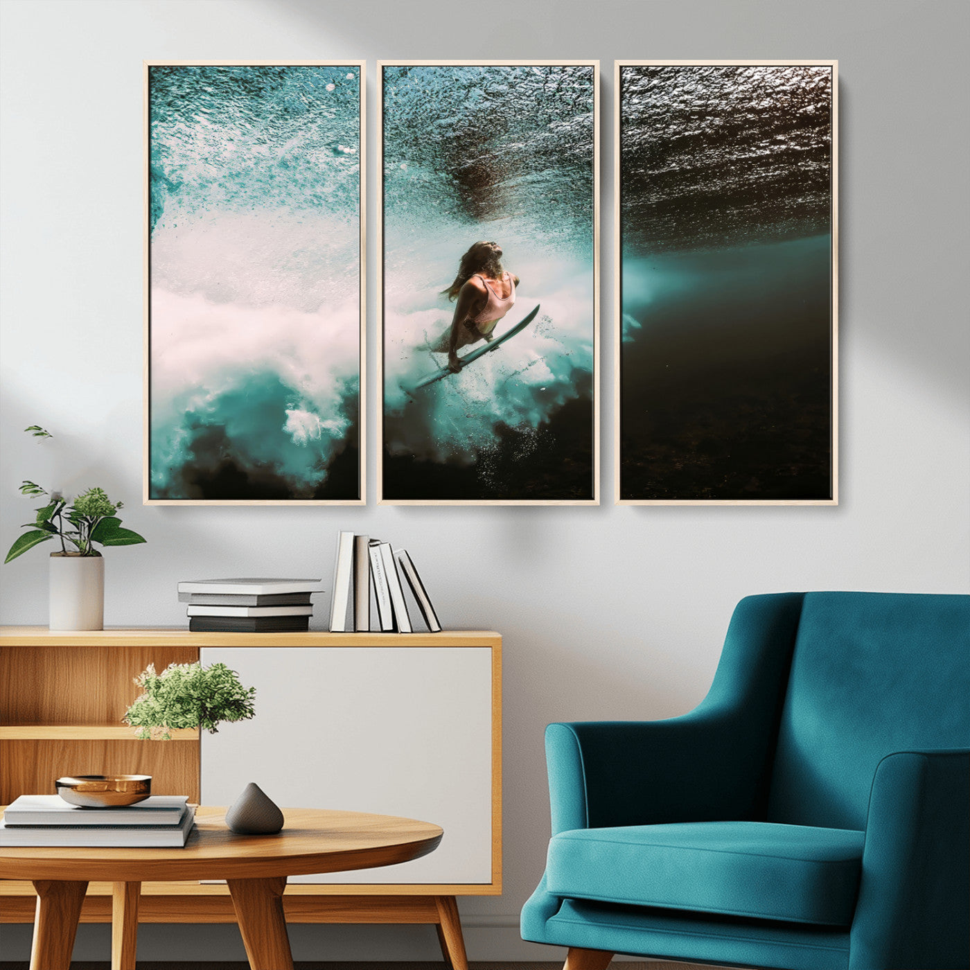 Vibrant underwater photo of a female surfer diving through turquoise waves, perfect for coastal boho or surf-inspired home decor.