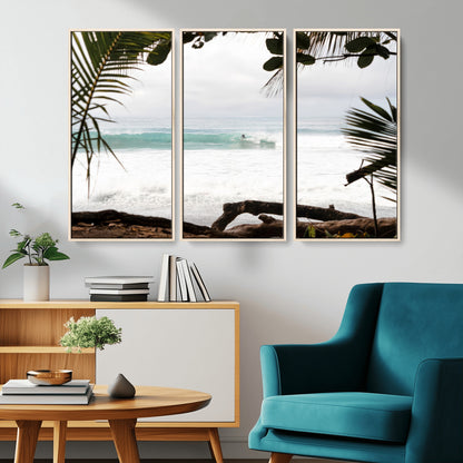 Tropical beach view with palm trees and surfer riding a wave, perfect for boho or coastal-inspired interior wall decor.