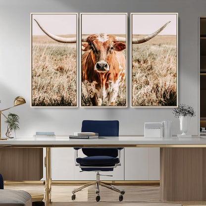 Framed longhorn cow canvas wall art with rustic prairie background, western animal print perfect for farmhouse or ranch style decor