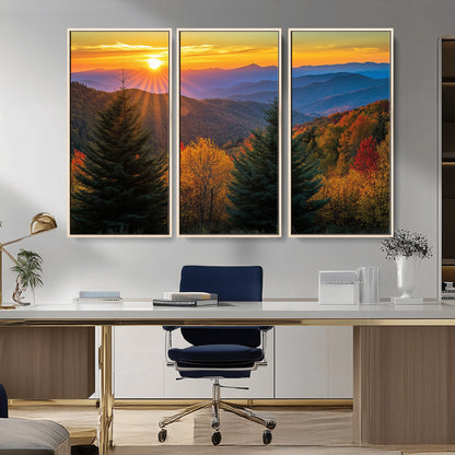Vibrant sunset over autumn mountains with colorful trees and warm light, ideal for nature lovers or cabin-style wall decor.