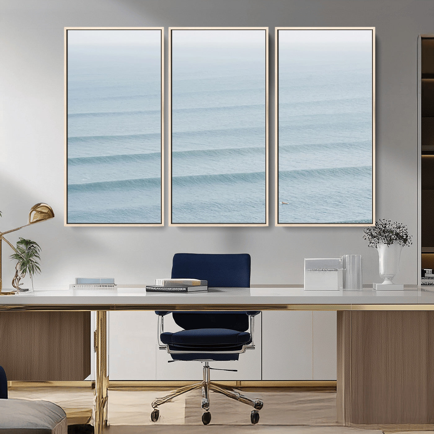 Framed canvas of repeating ocean waves with a distant solo surfer, ideal for minimalist ocean or calm coastal wall decor.