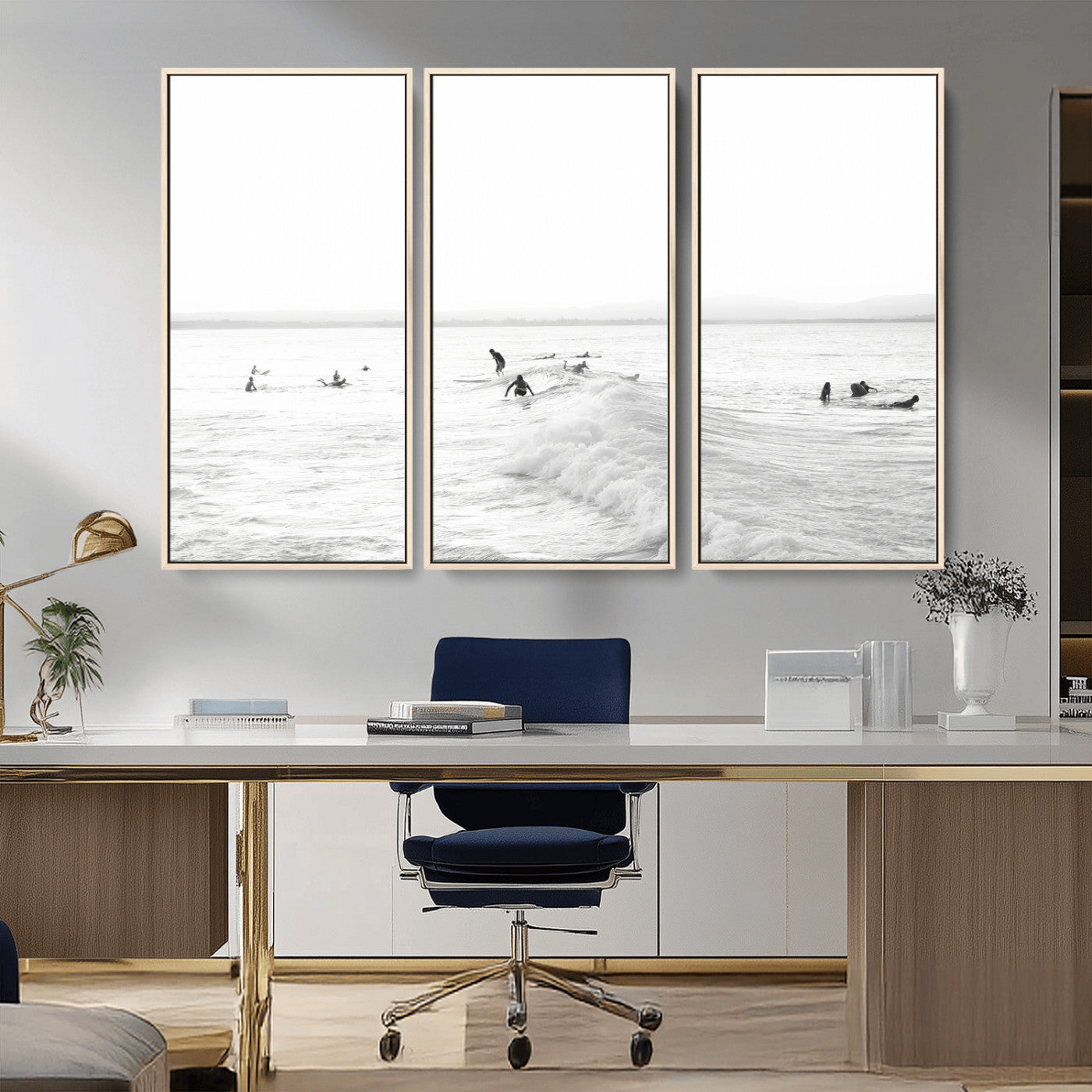 Monochrome photo of surfers riding and waiting on ocean waves, ideal for surf-themed or coastal energy wall decor.