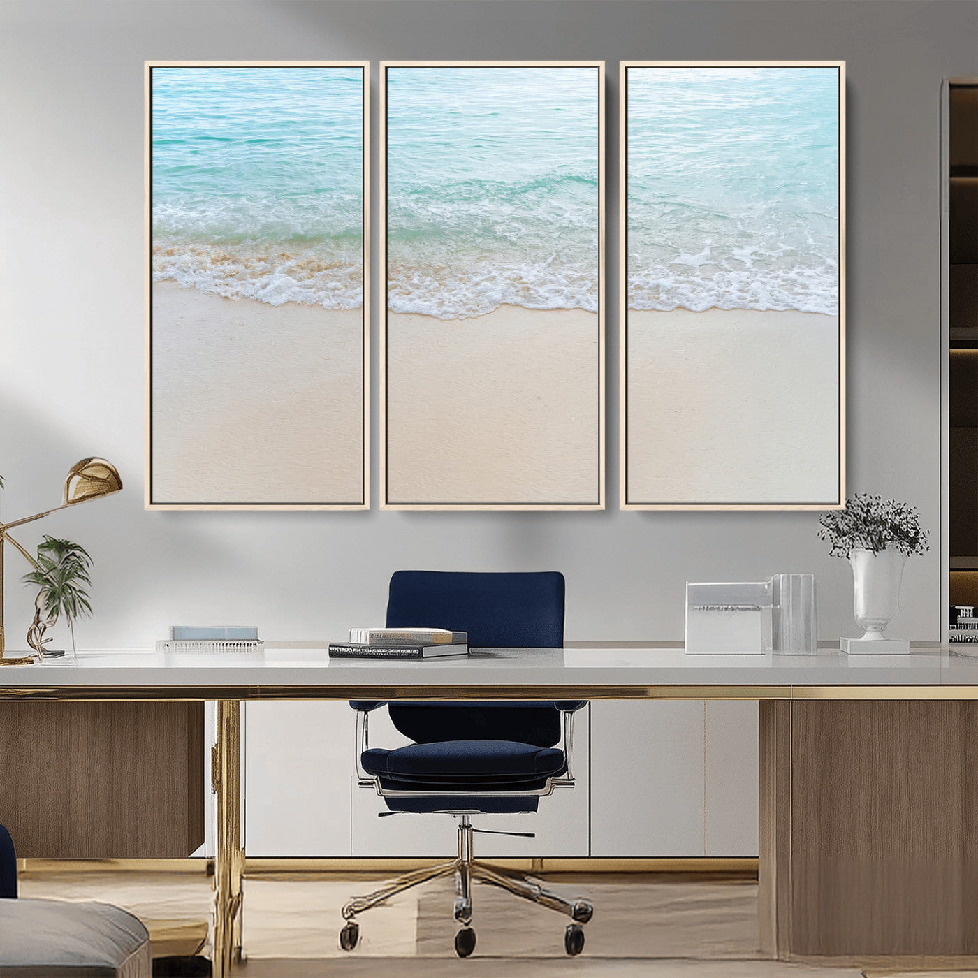 Soft shoreline with gentle aqua waves on smooth sand, ideal for minimalist coastal or pastel ocean-inspired home wall decor.