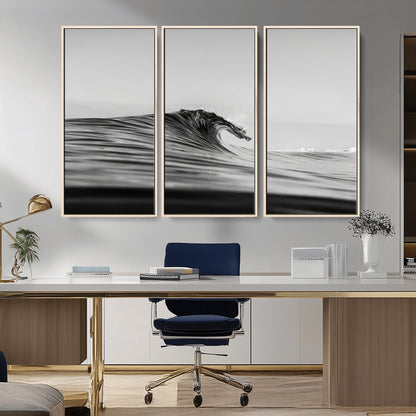 Striking black and white photo of a curling wave, ideal for modern coastal or minimalist wall decor settings.
