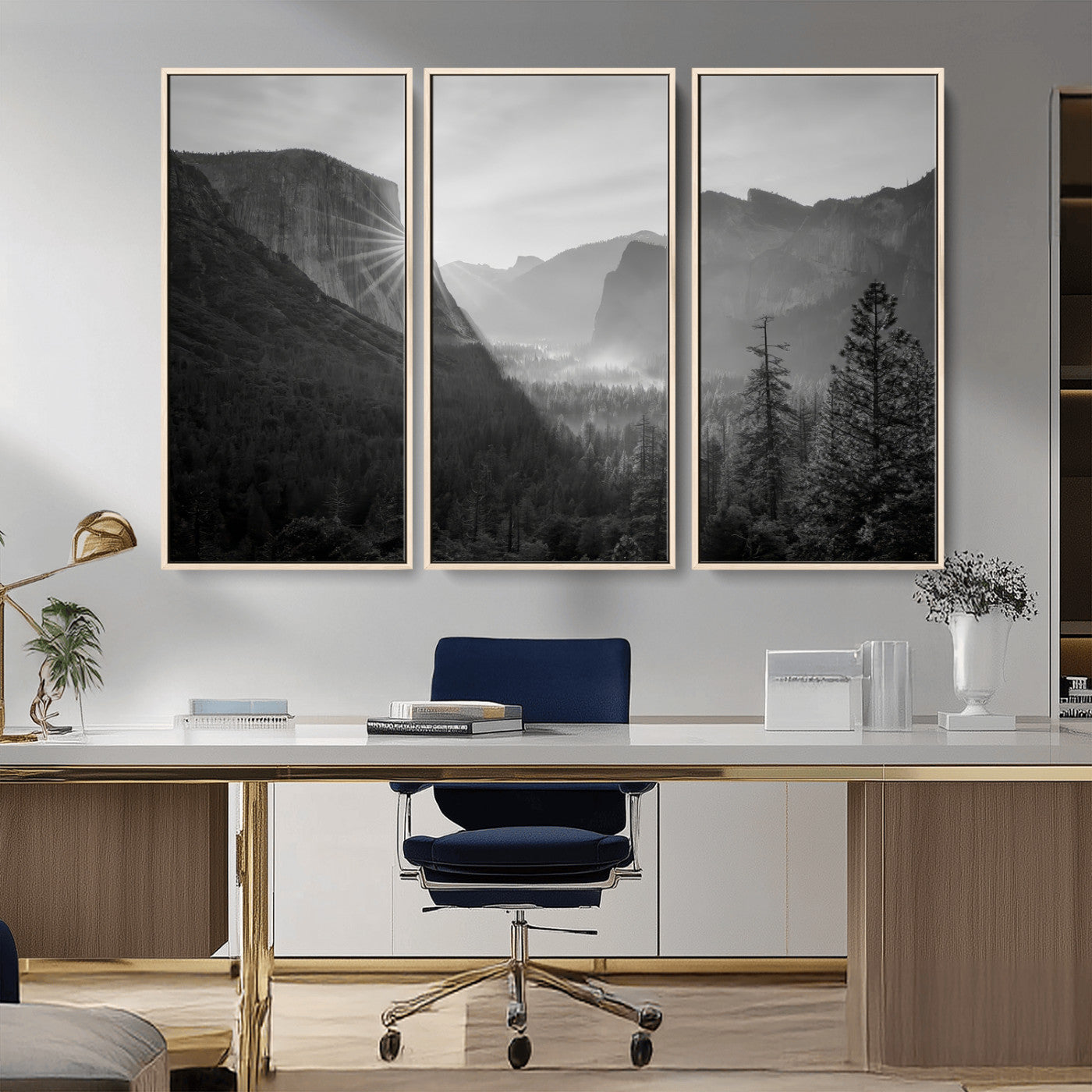 Black and white landscape of Yosemite with sun rays peeking over El Capitan, ideal for moody nature or modern rustic decor.