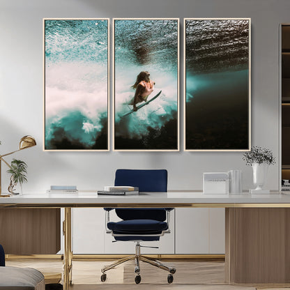 Vibrant underwater photo of a female surfer diving through turquoise waves, perfect for coastal boho or surf-inspired home decor.