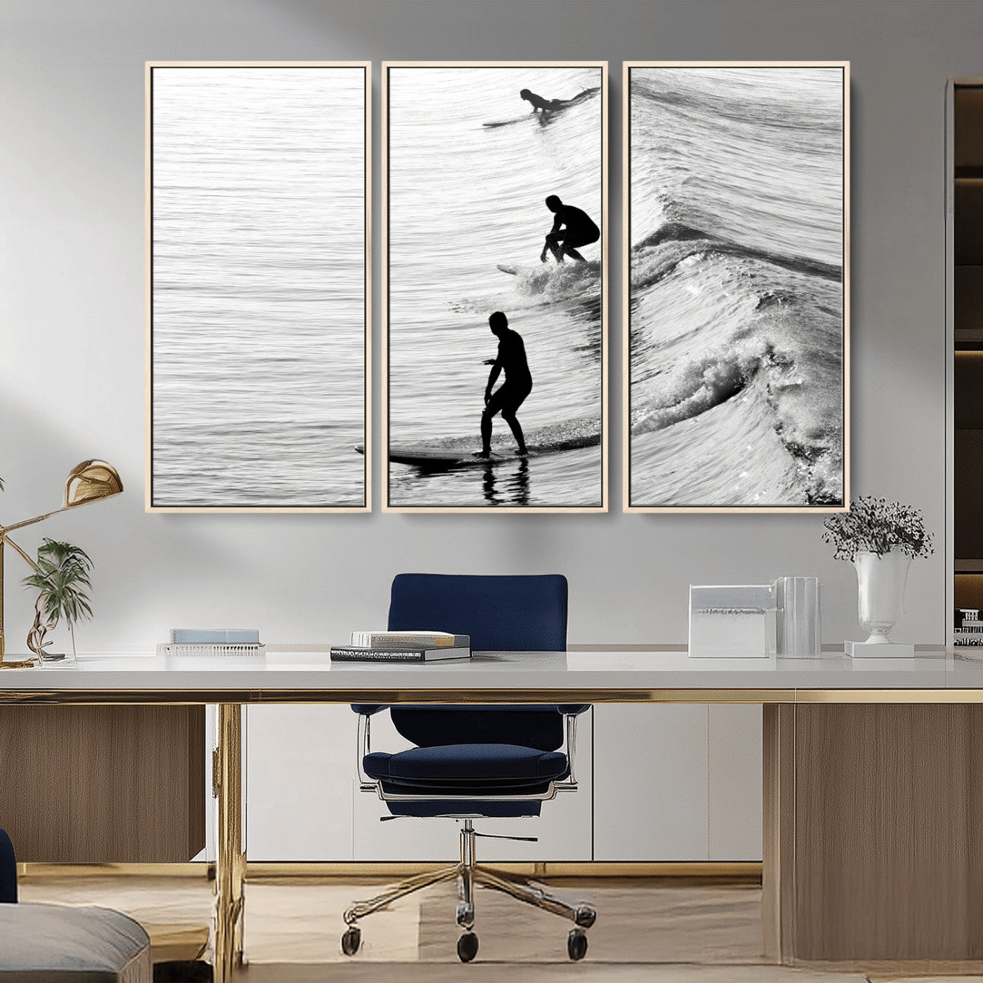 Black and white photo of surfers riding waves in a moody, high-contrast scene, ideal for modern coastal or surf-inspired home decor.