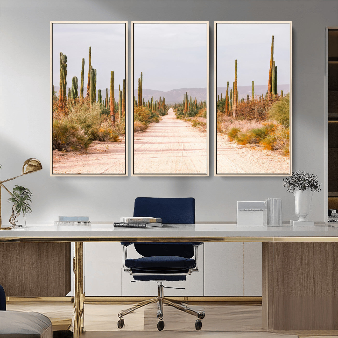 A desert road lined with saguaro cacti under a golden sky, creating a warm southwestern feel, perfect for boho or rustic decor.