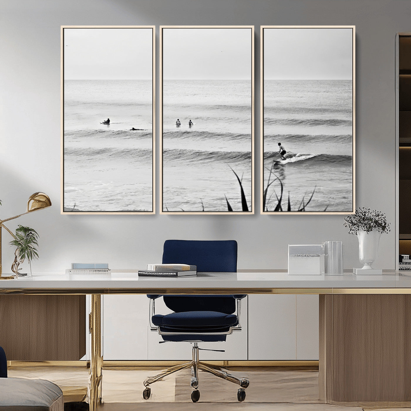 Monochrome canvas of surfers on calm ocean waves, ideal for minimalist coastal or beach-inspired interior decor.