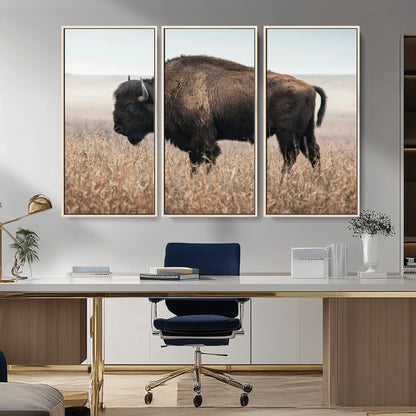 A lone bison stands in a vast prairie under a soft sky, evoking freedom and rustic charm for western or farmhouse inspired interiors.