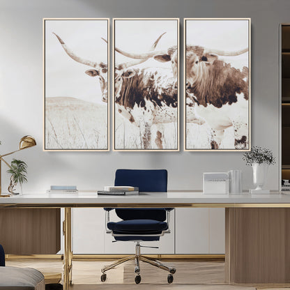 Two longhorn cows standing in a sepia-toned pasture with soft light, ideal for rustic or farmhouse-themed neutral wall decor.