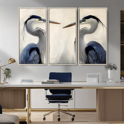 Two blue herons facing each other on a soft neutral background, ideal for coastal, tranquil, or nature-inspired minimalist interiors.
