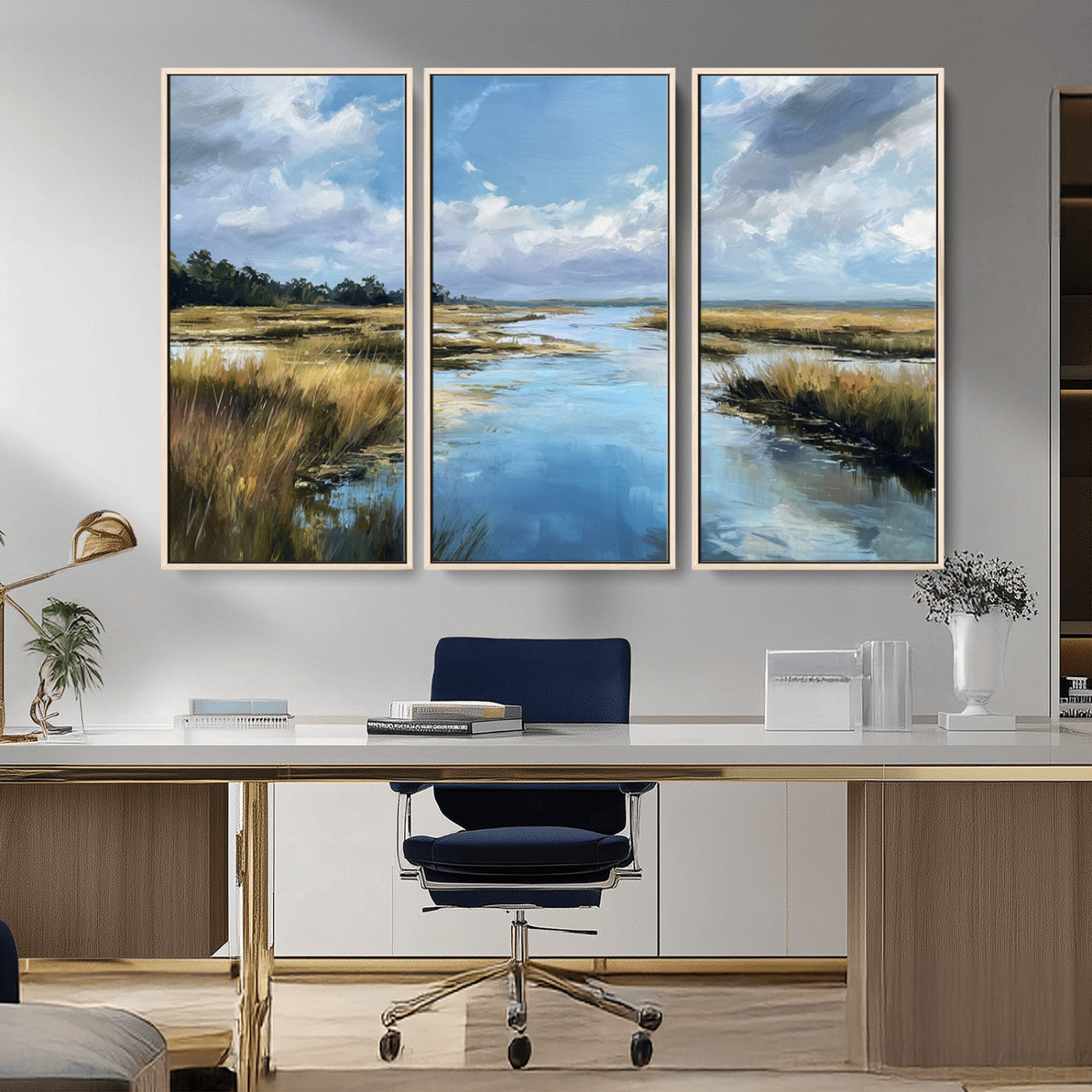 A beautiful, painterly landscape of a calm river winding through a marsh, with vibrant green grasses and a bright blue sky filled with fluffy clouds.