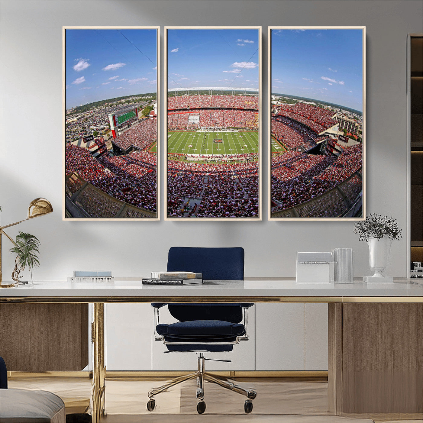 An William Brice-Stadium view of a full football stadium with cheering fans and clear blue skies, capturing the excitement and energy of the game.