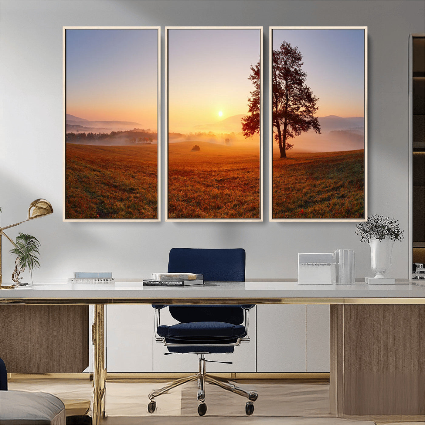 A tranquil landscape at sunrise with a mist-covered field and a lone tree, creating a peaceful and natural atmosphere.