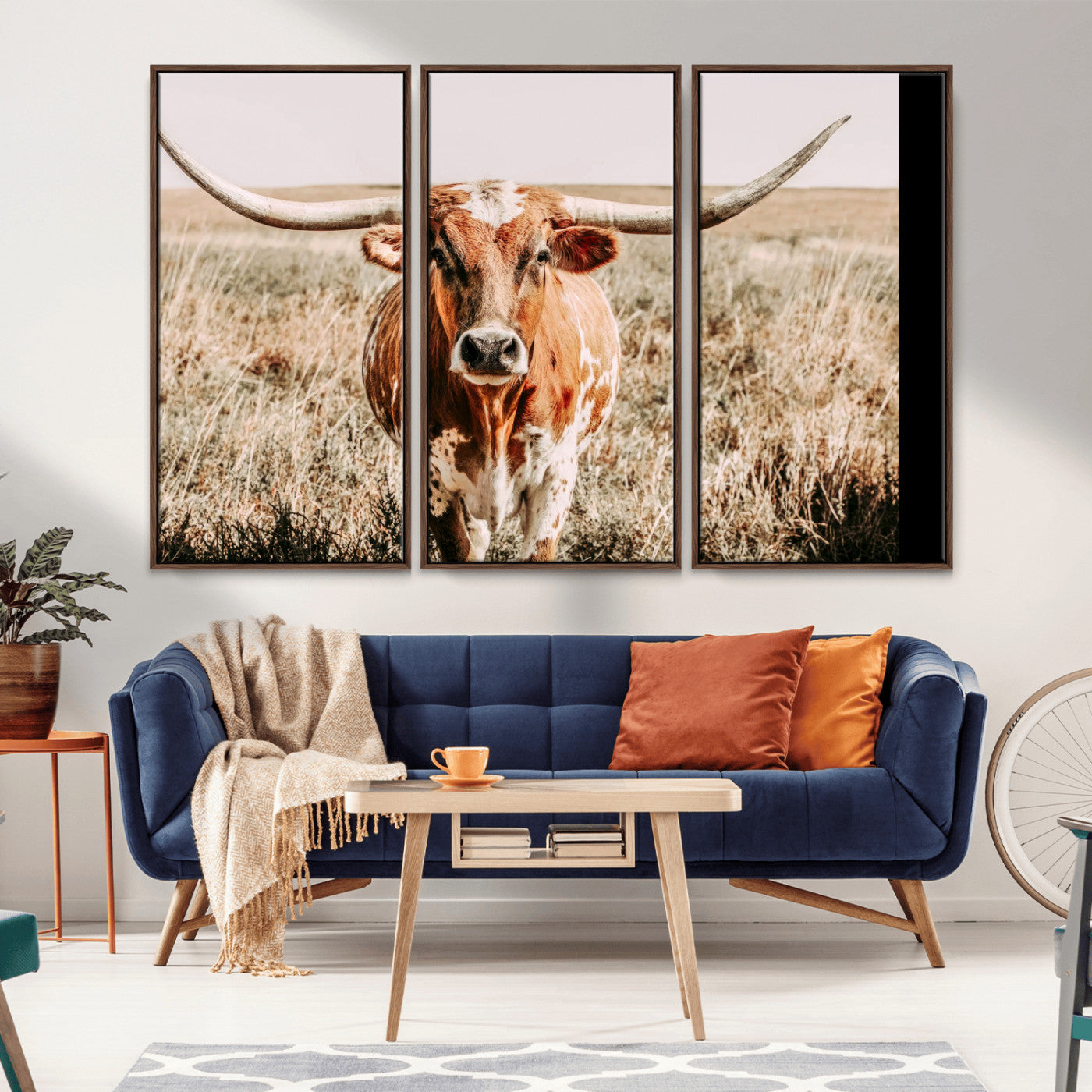 Framed longhorn cow canvas wall art with rustic prairie background, western animal print perfect for farmhouse or ranch style decor