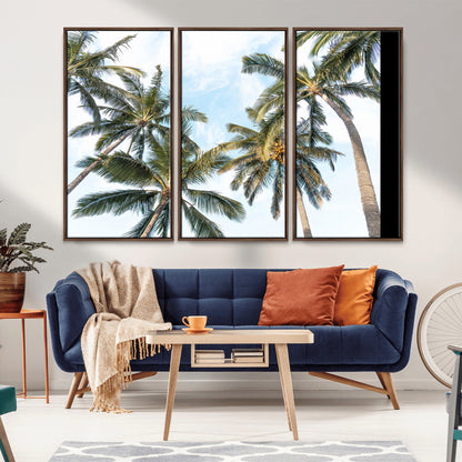 Framed canvas of tall palm trees reaching into a tropical sky, ideal for beach home or relaxed island-inspired wall decor.