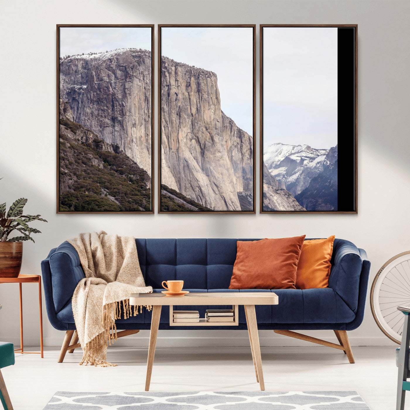 Framed canvas of El Capitan’s vertical granite face in Yosemite with snowy peaks, ideal for Sierra minimalism or mountain-inspired decor.