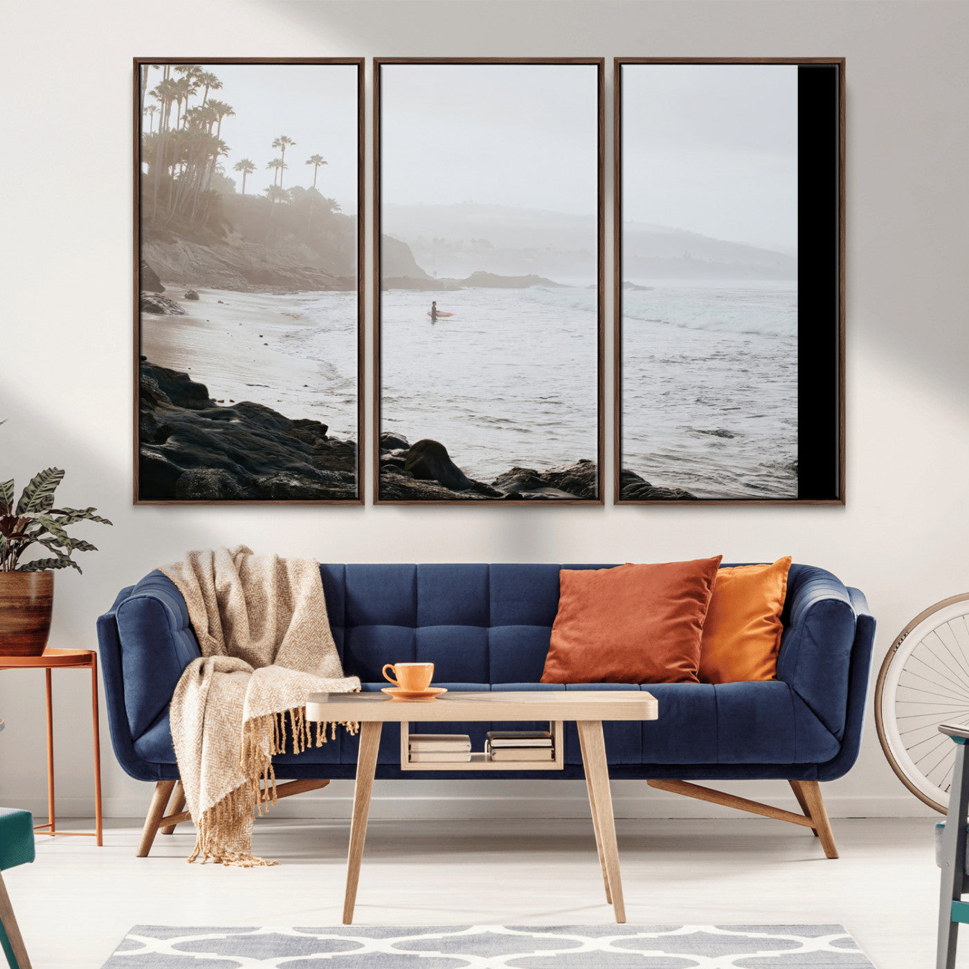 Framed canvas of a surfer in misty coastal tones at a foggy California beach, ideal for minimalist coastal beach or serene ocean-themed decor.