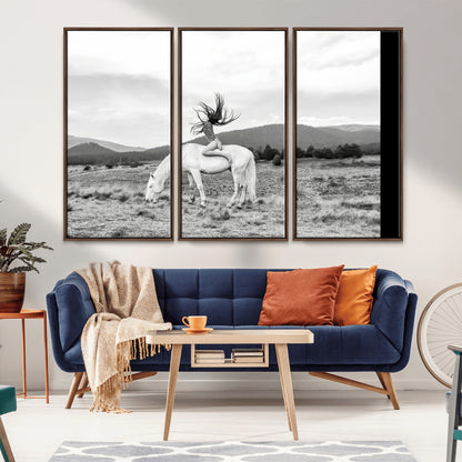 Black and white photo of a woman on a white horse in moody tones, ideal for Western Boho or modern rustic-style home decor.