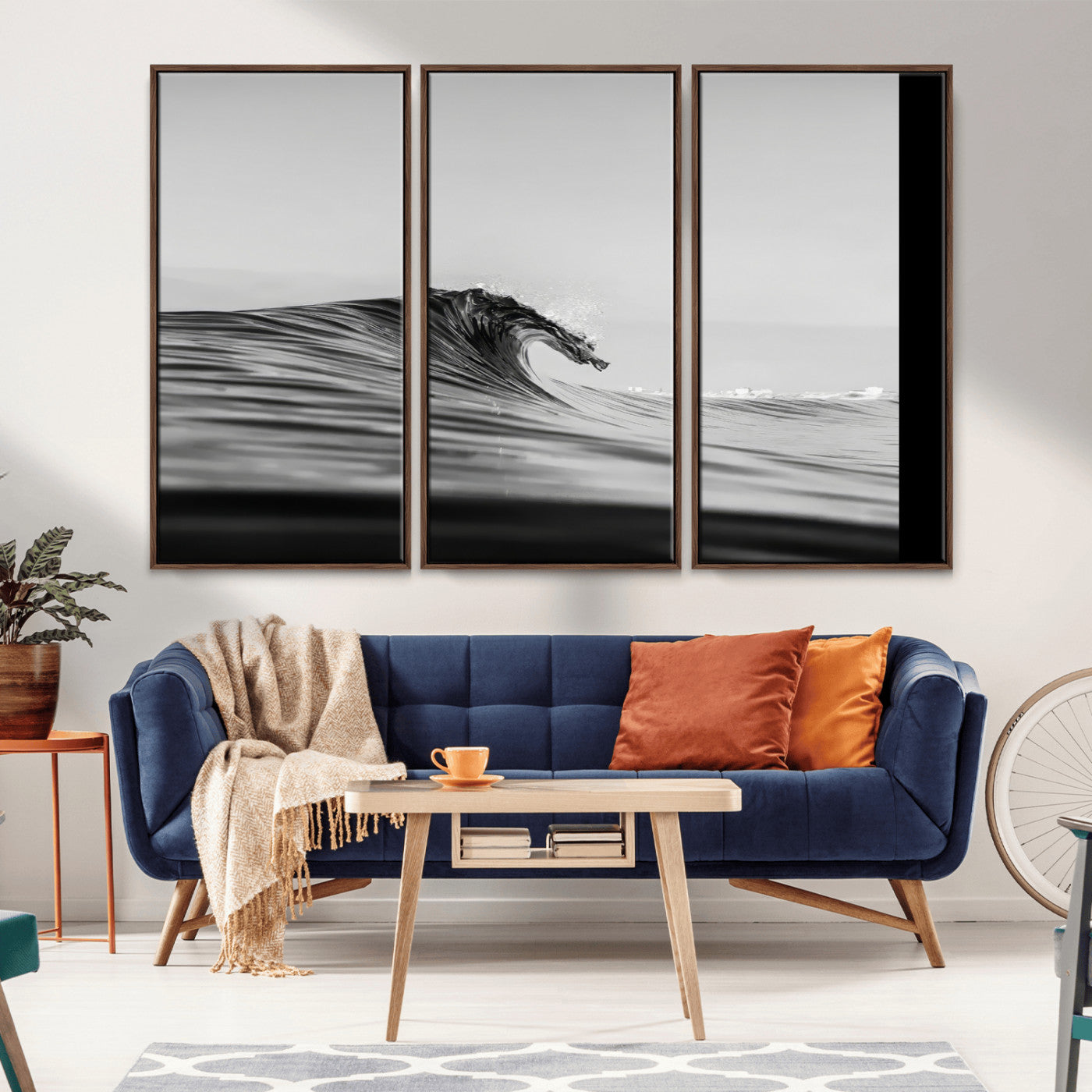 Striking black and white photo of a curling wave, ideal for modern coastal or minimalist wall decor settings.