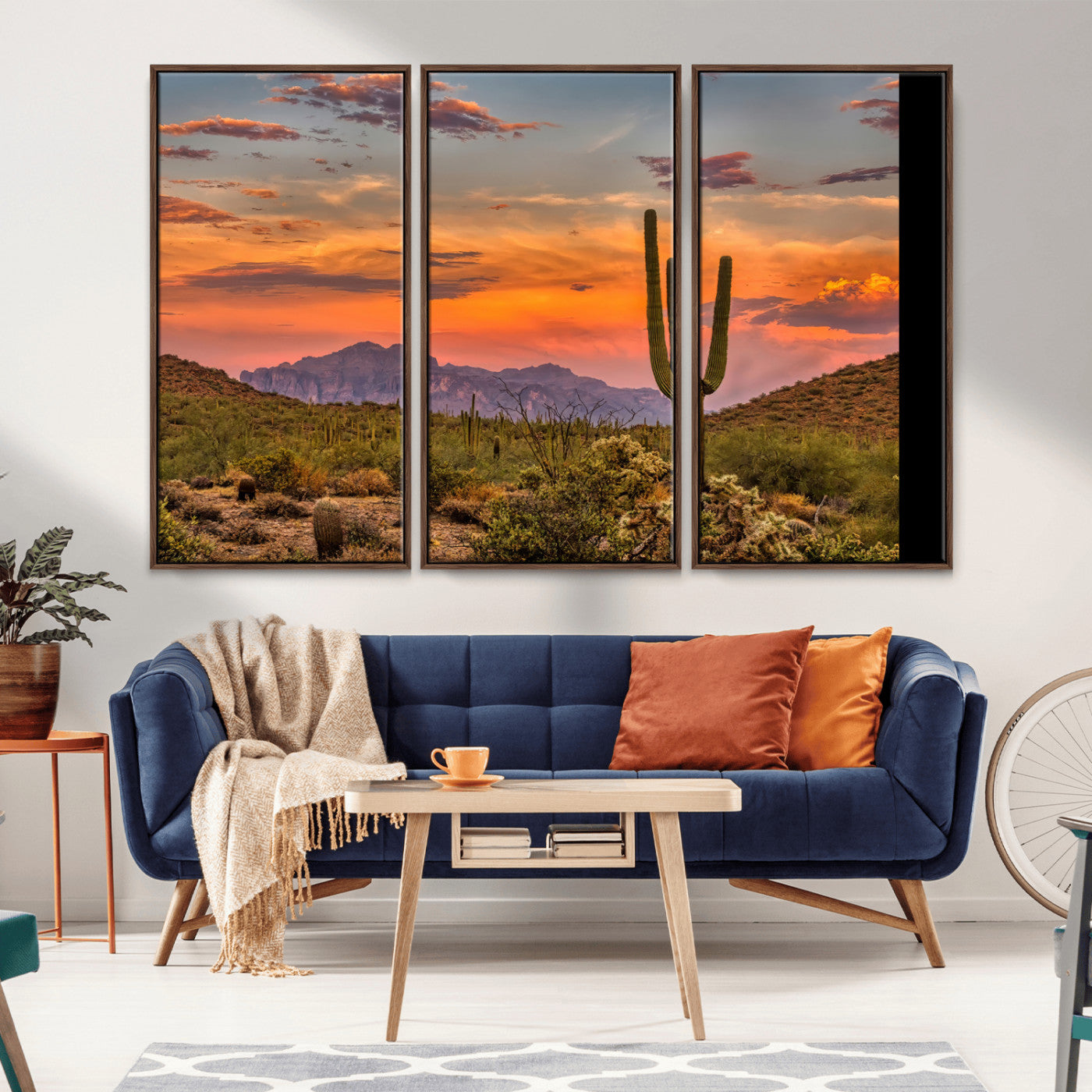 Vibrant desert sunset with saguaro cacti and distant mountains, perfect for Southwestern or warm-toned home decor.